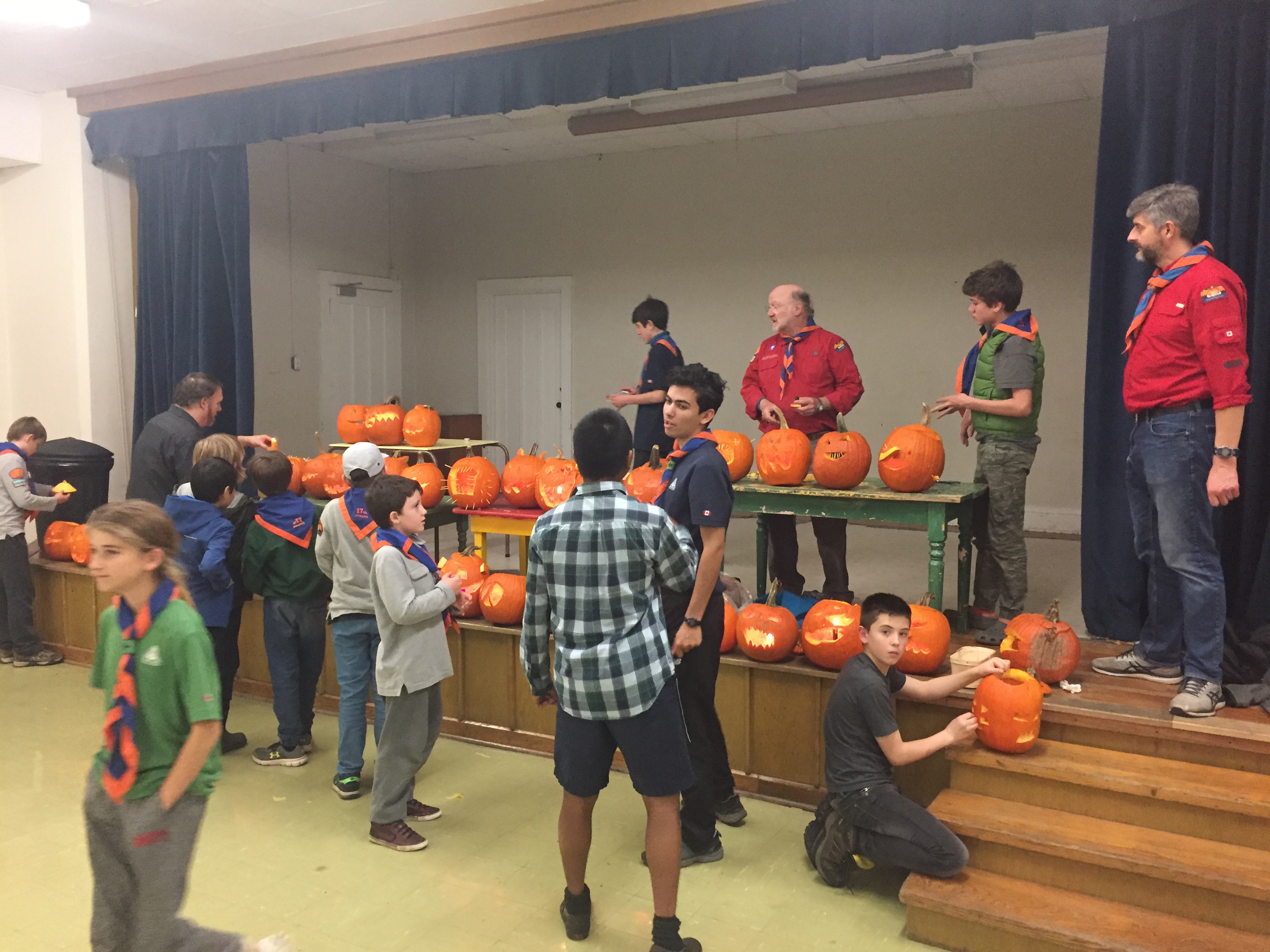 Cubs and Scouts carve pumpkins